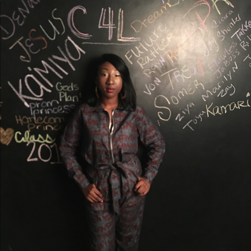 Dark denim jumpsuit graffiti print